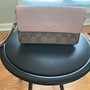 Coach wristlet like new pink brown